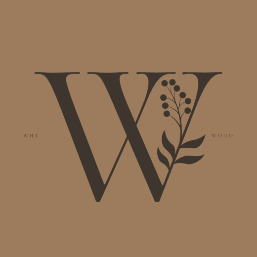 Stylized black letter 'W' on a brown background with a branch and berries integrated into the design. The words 'WHY' and 'WOOD' are written in small black letters on either side of the 'W', suggesting a brand or company named 'Why Wood'.